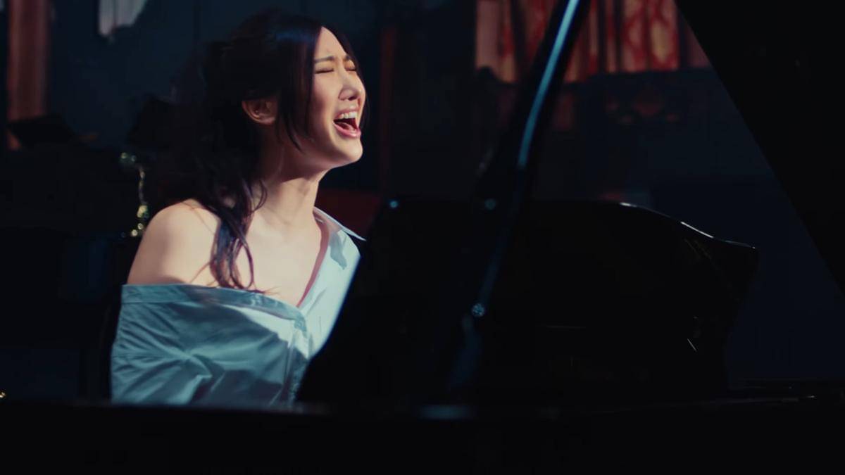 Ejae di MV In Another World (youtube.com/ejaeofficial)