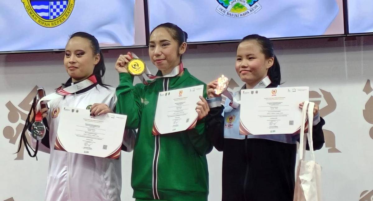 Kelly (kanan) meraih perunggu wushu nomor Gun Shu (dok.SIWO PWI Sumut)
