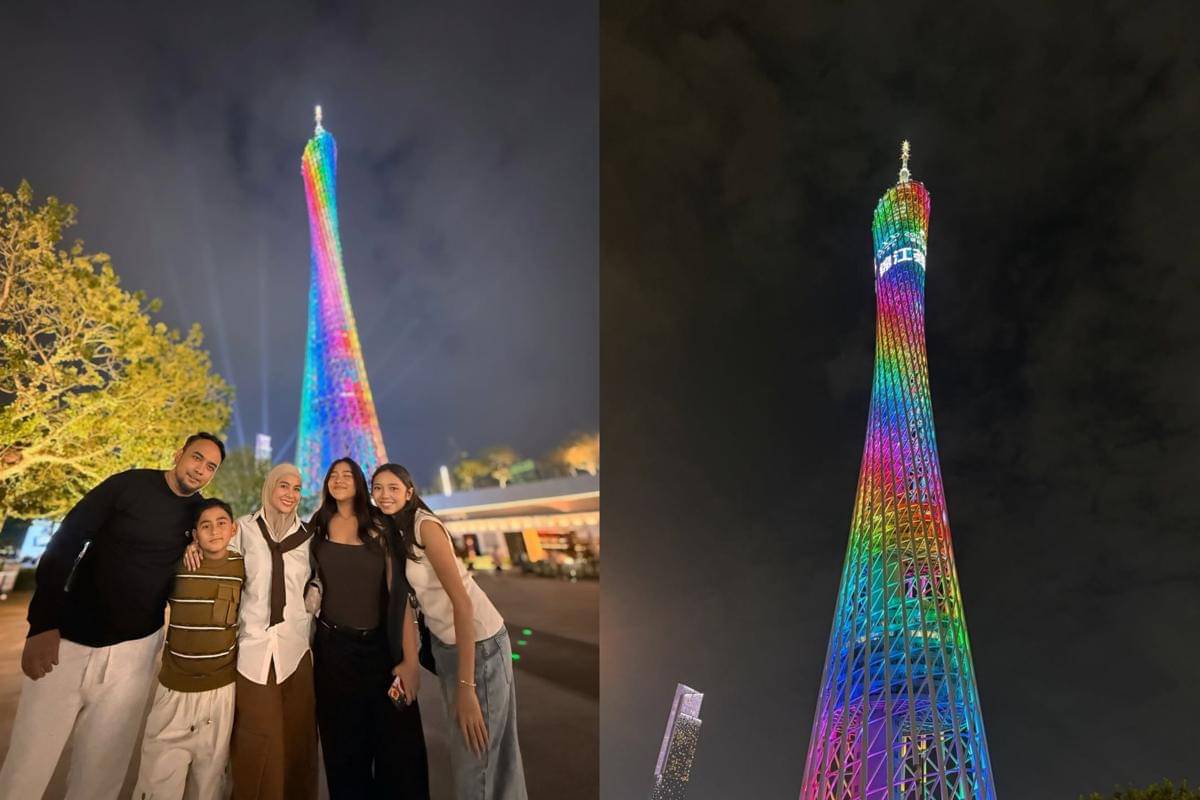 Meisya Siregar dan keluarga berlatar Canton Tower, Guangzhou, China