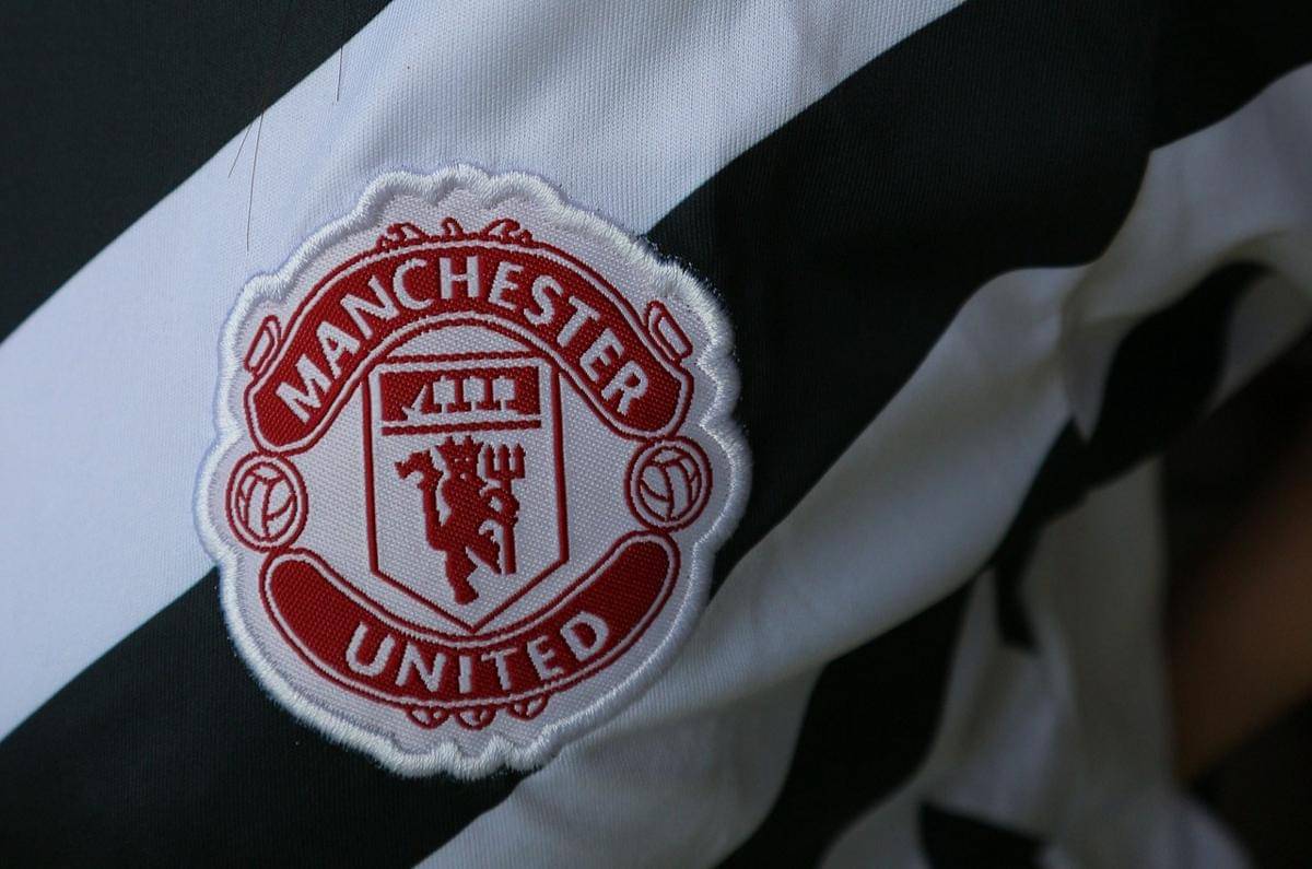 ilustrasi logo Manchester United