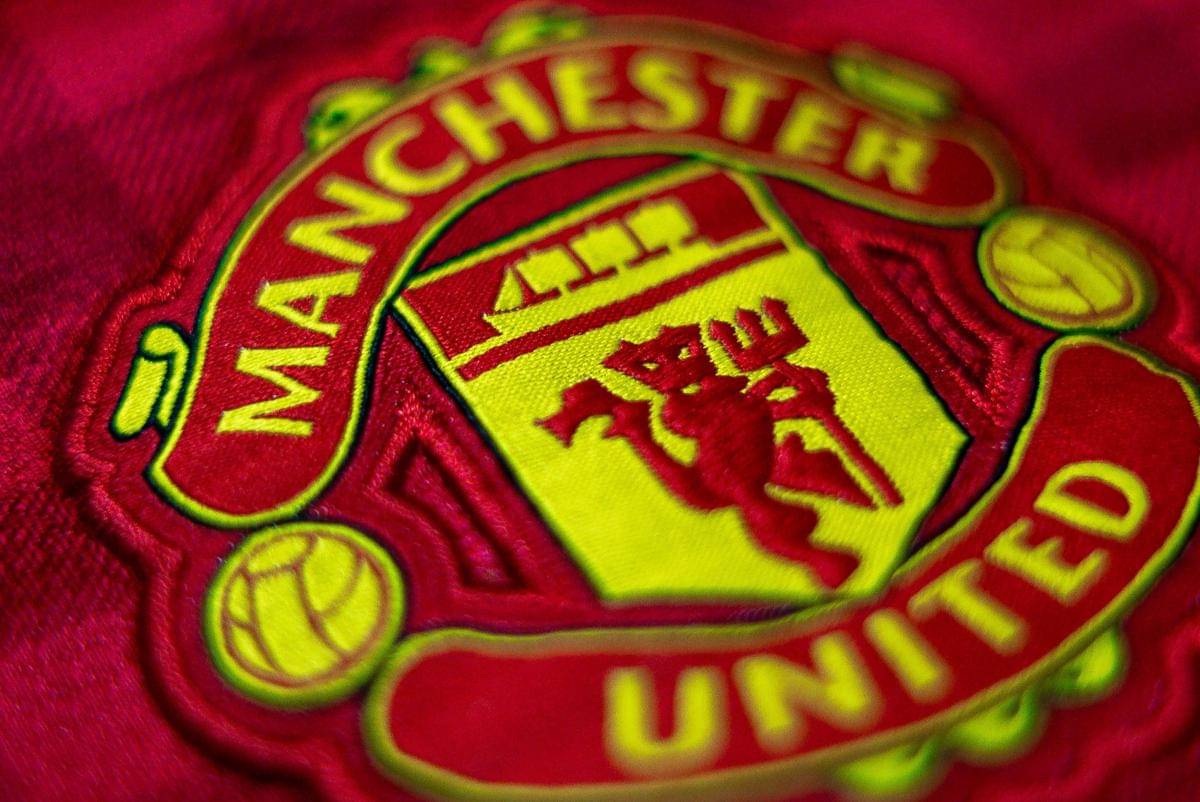 ilustrasi logo Manchester United