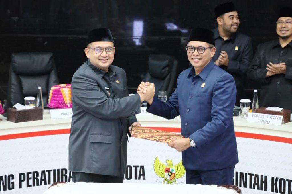 Wali Kota Makassar Munafri Arifuddin (kiri) dan Ketua DPRD Makassar Supratman. (Dok. Pemkot Makassar)