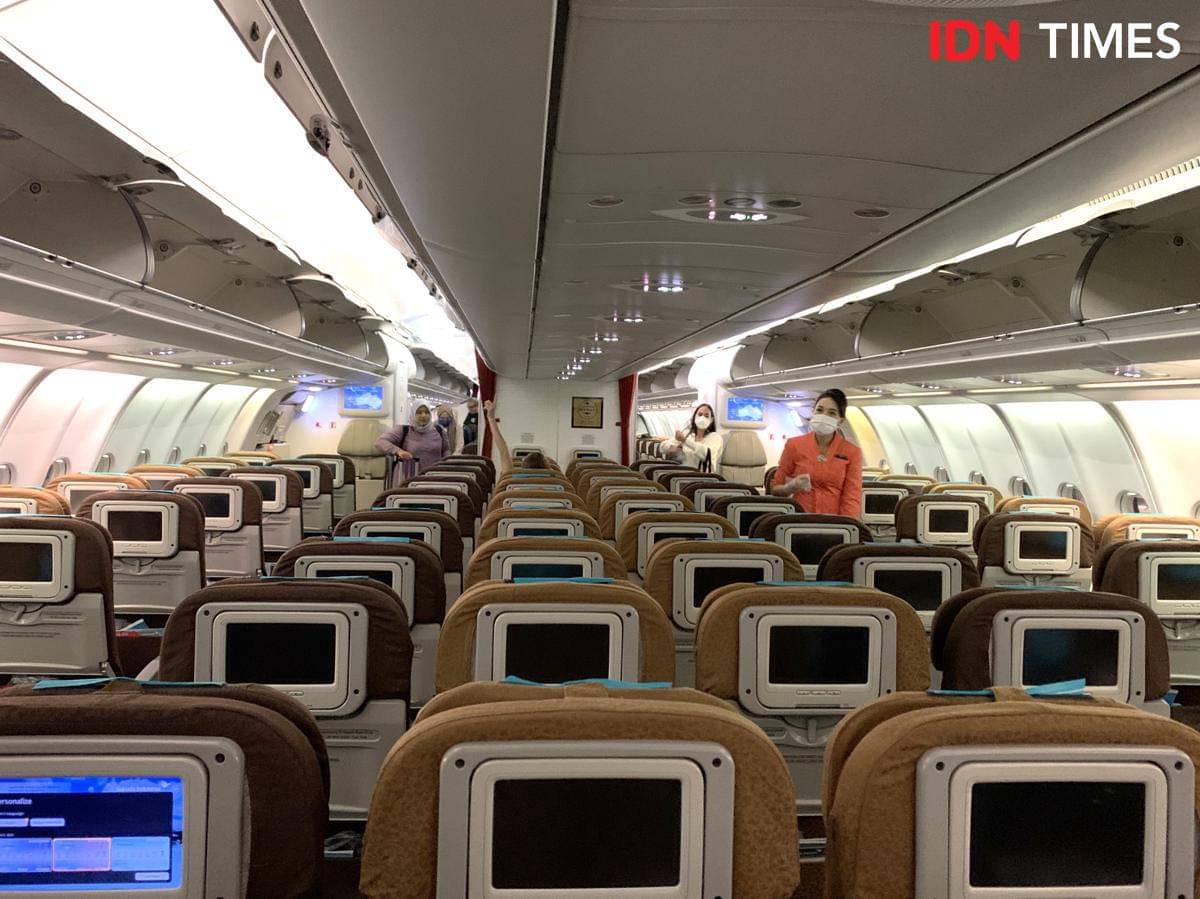 Potret tempat duduk di pesawat terbang