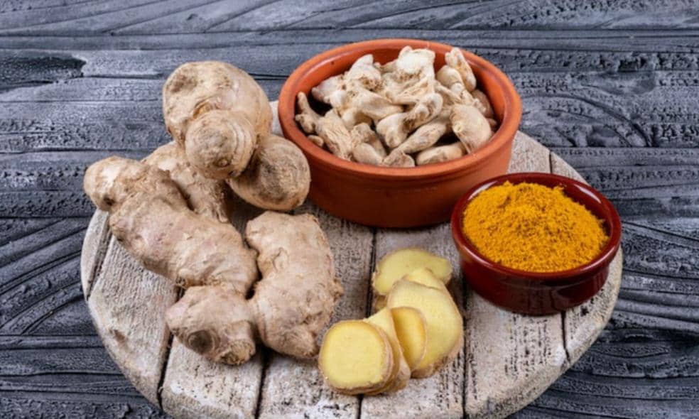 ilustrasi jahe dan bubuk kunyit