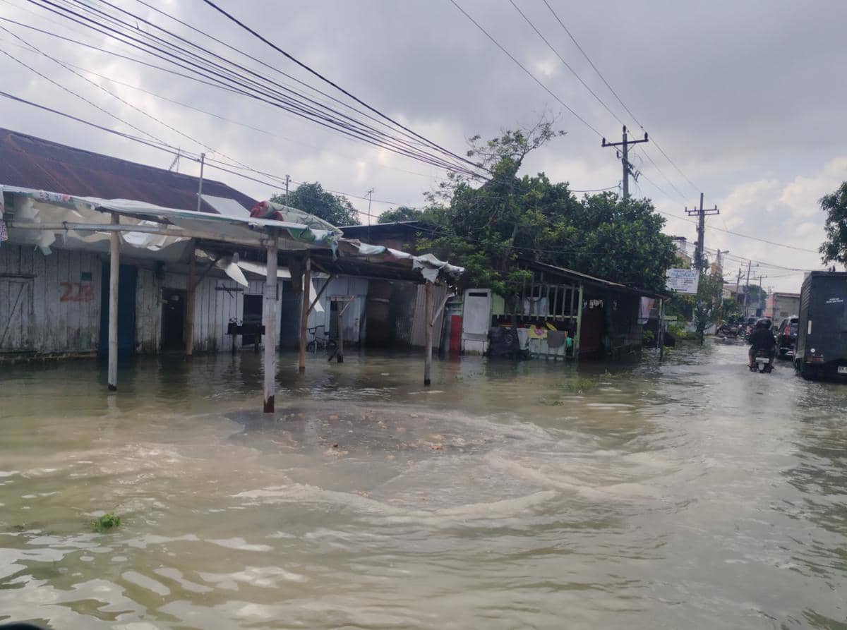 Rumah warga di Desa Laut Dendang terdampak banjir.