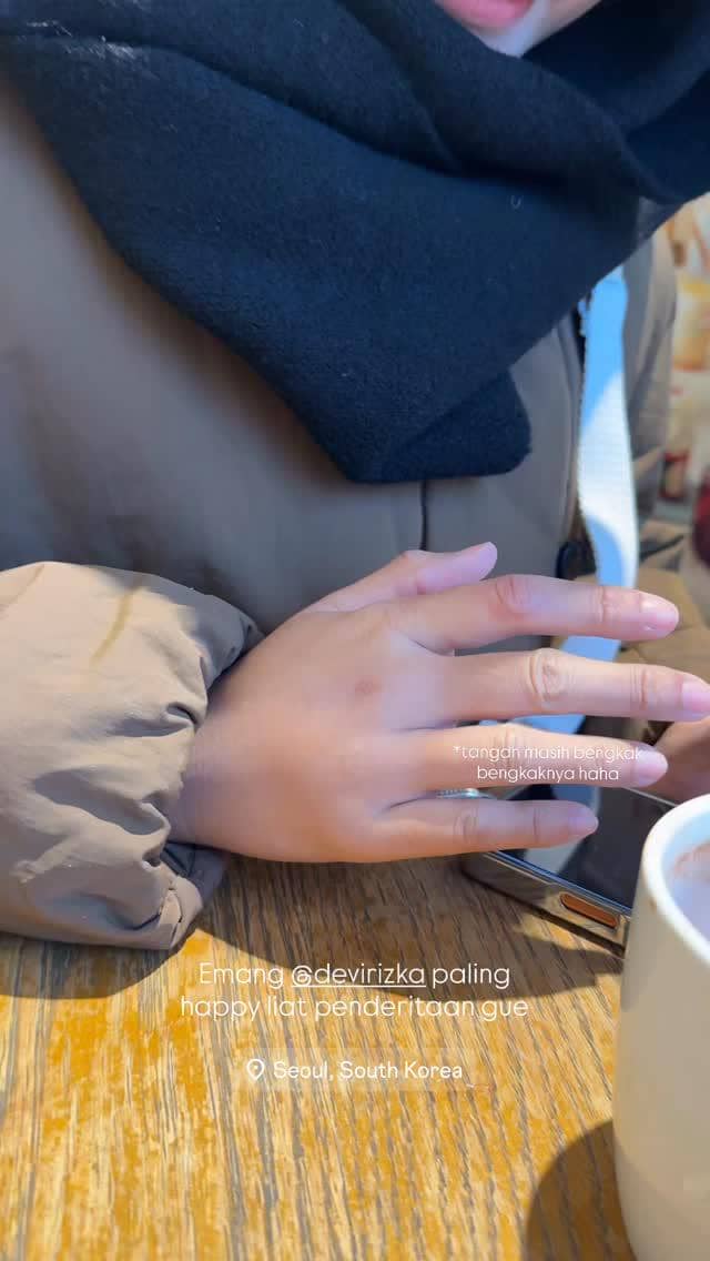 Audi Marissa liburan di Korea Selatan saat musim dingin. 