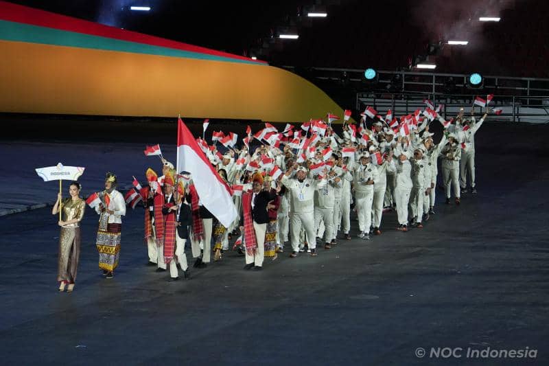 Defile Tim Indonesia di Upacara Pembukaan SEA Games 2025 Thailand (NOC Indonesia / Mochammad Rifqi Priadiansyah)