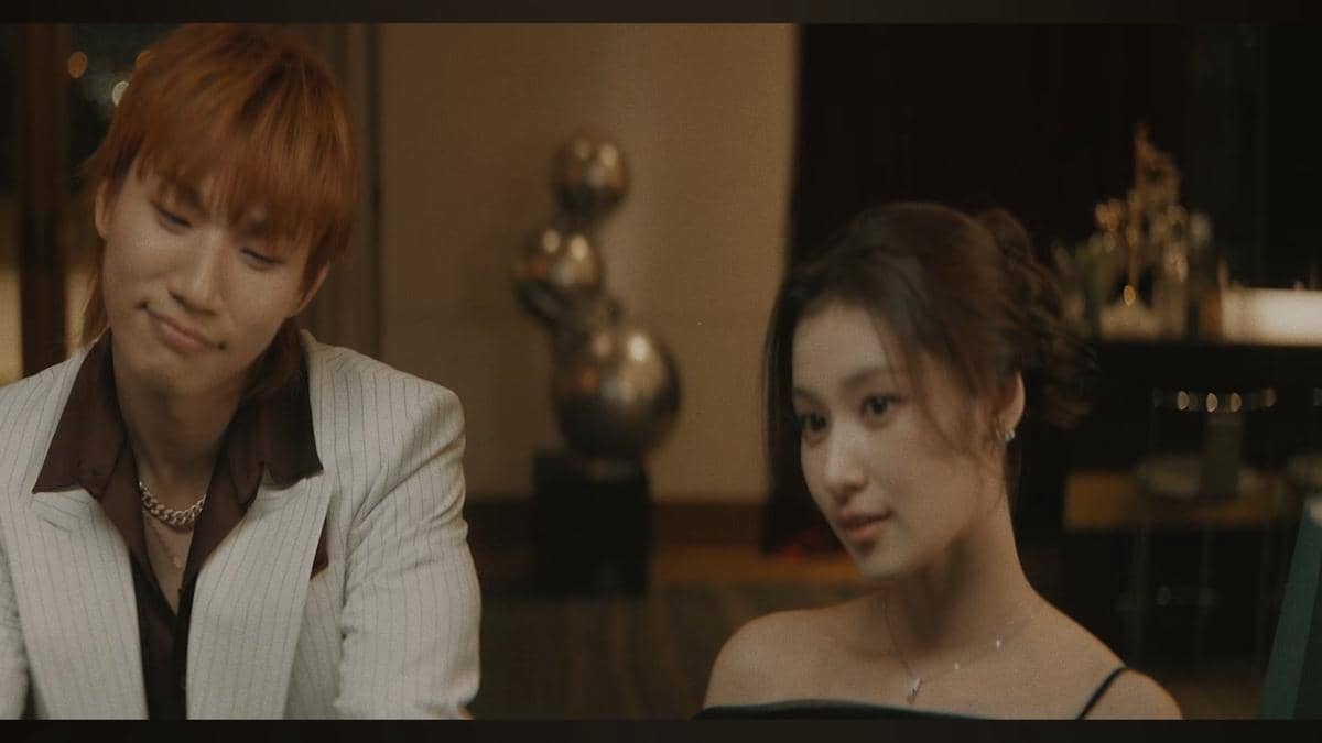 potret Daesung BIGBANG dan Sana TWICE di MV HANDO-CHOGUA