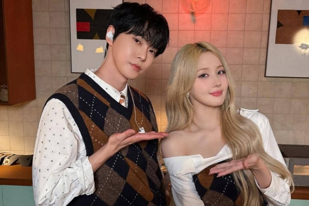 potret Doyoung NCT dan Belle KISS OF LIFE