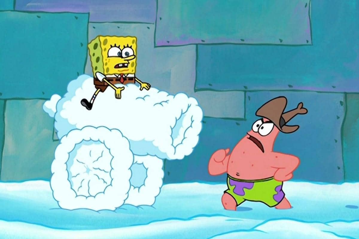 SpongeBob dan Patrick bermain di area bersalju yang turun di Kubah Pohon milik Sandy