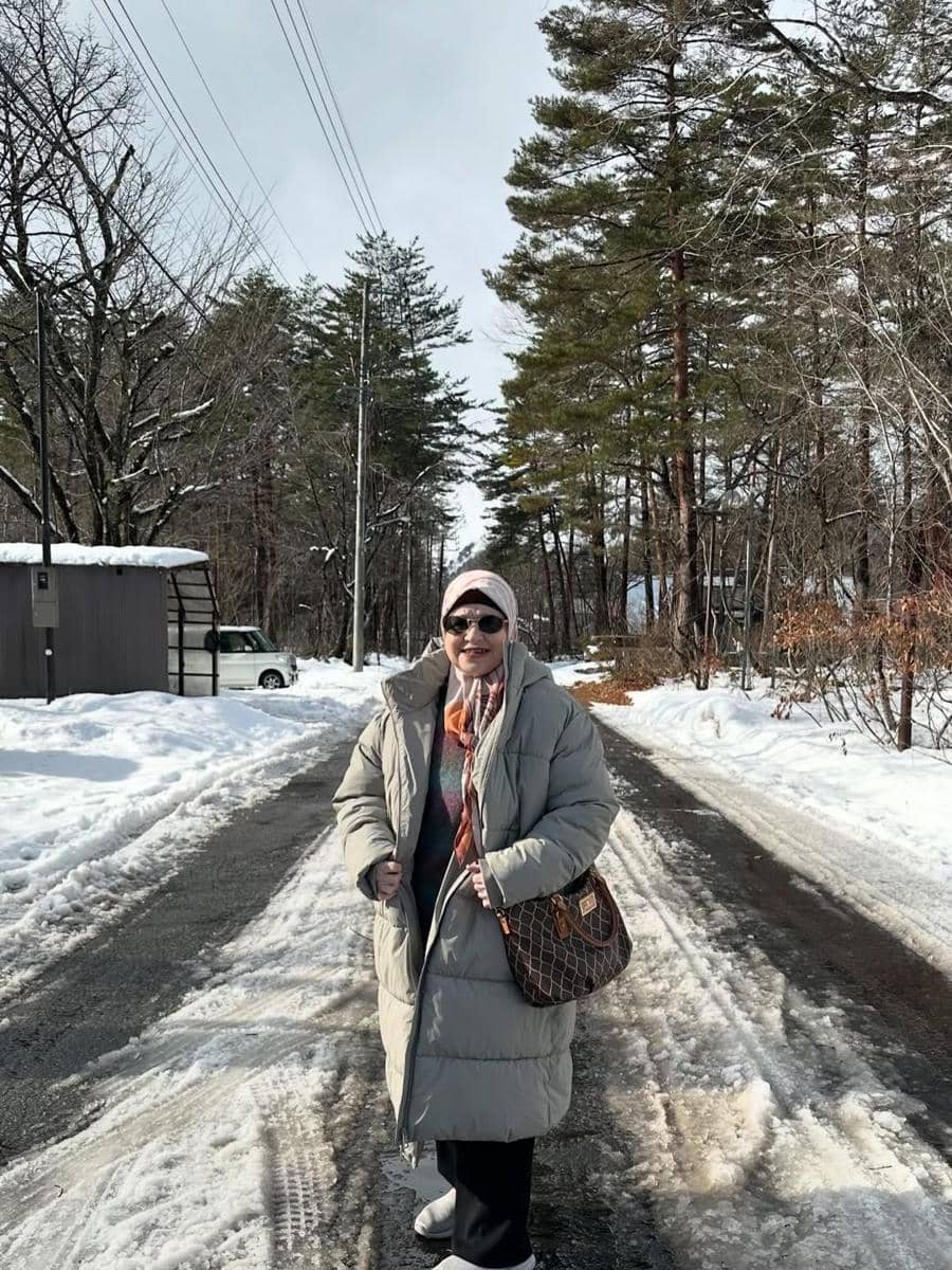 Pak Muh dan Mama Ida liburan di Jepang.