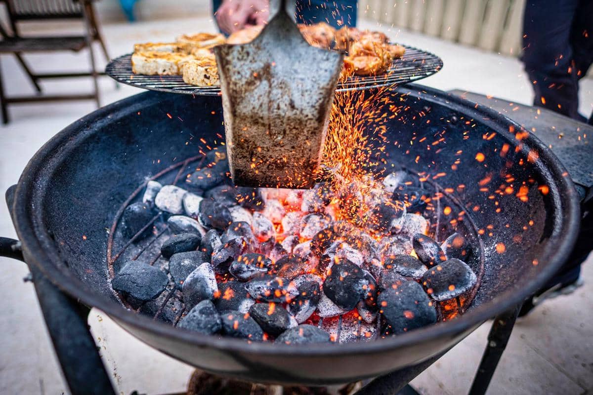 https://www.pexels.com/photo/grilling-meat-on-a-charcoal-grill-5533764/