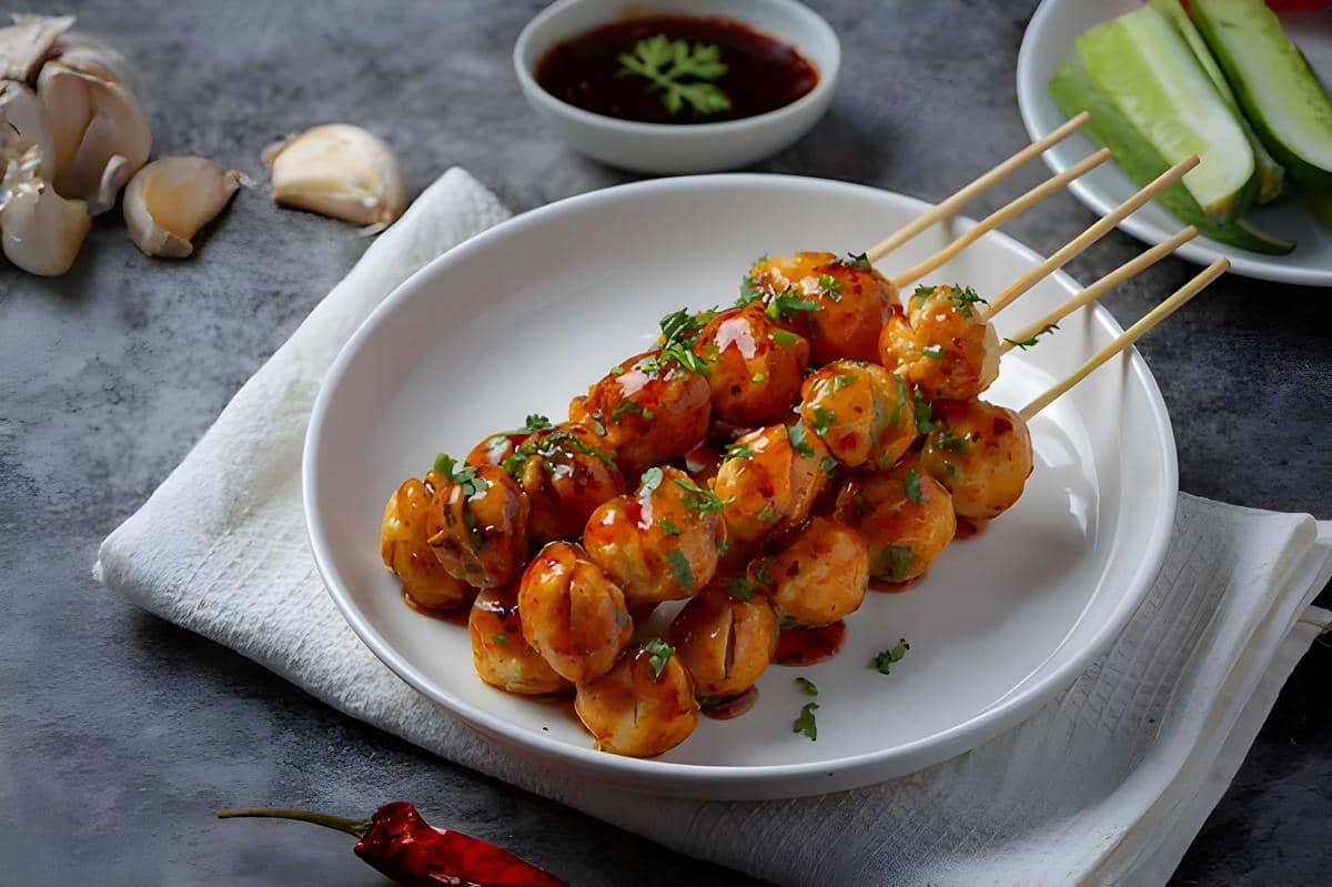 Ilustrasi bakso bakar pedas manis