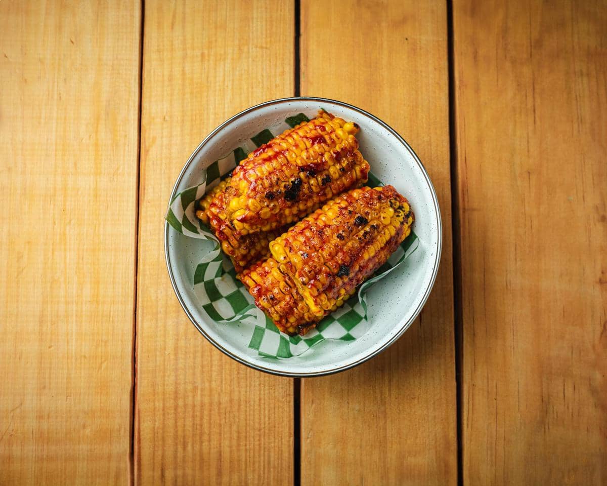 ilustrasi jagung bakar keju pedas korea