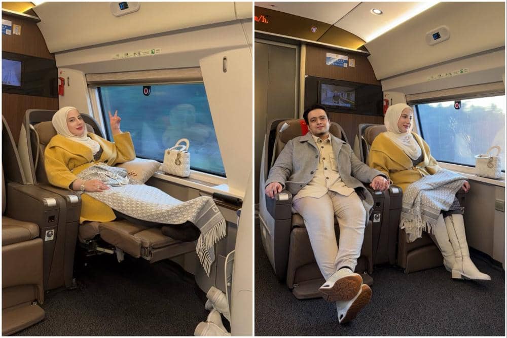 Tasyi Athasyia naik kereta bisnis dari Guangzhou ke Shanghai.