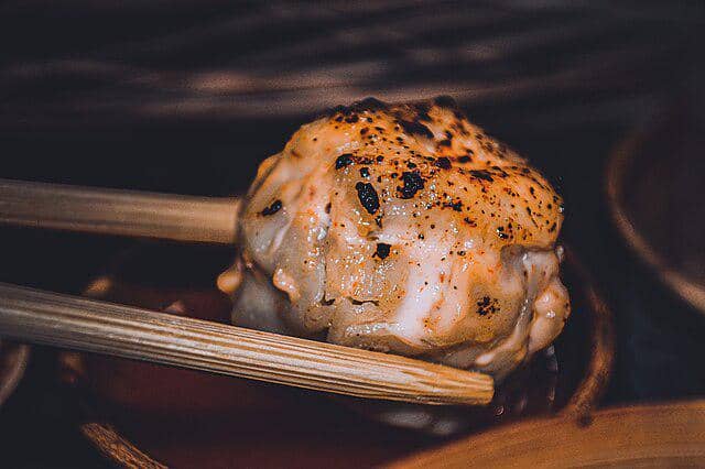 ilustrasi dimsum mentai yang ditorch