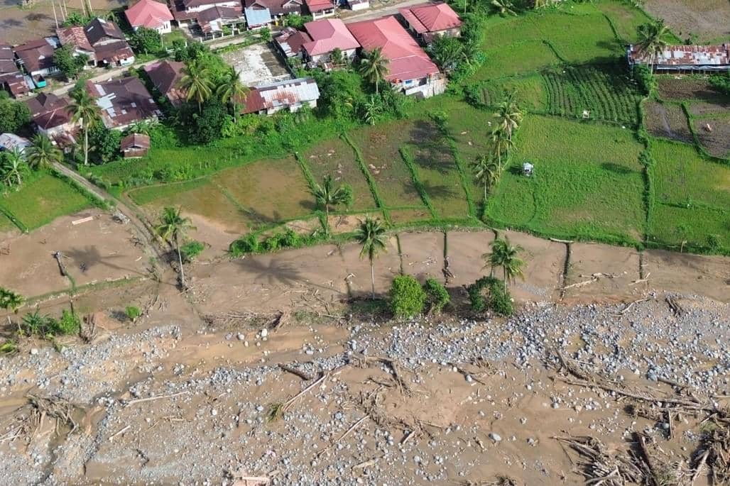 Ilustrasi sawah rusak setelah banjir melanda