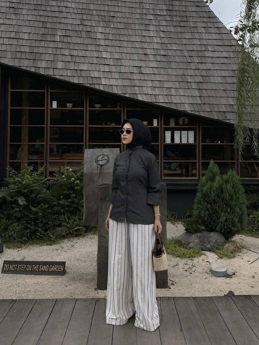 potret ide OOTD badass nuansa hitam yang anti boring ala Reni Marlina
