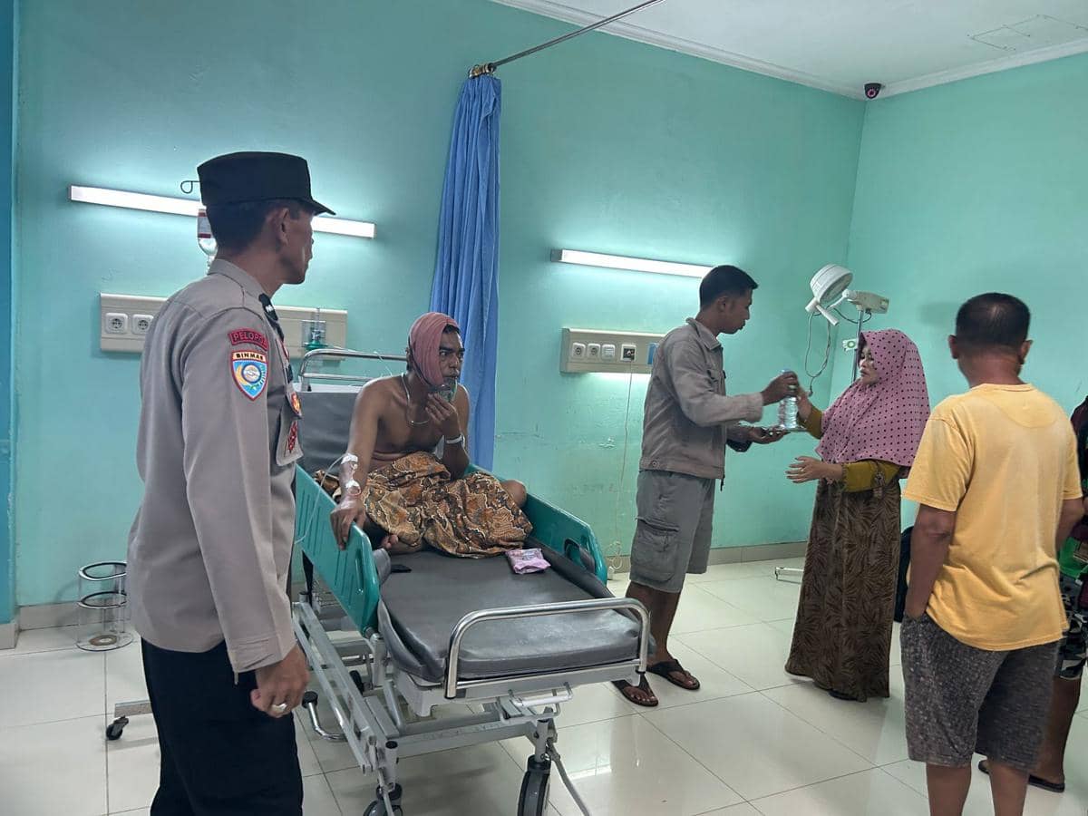 Kondisi Kades Bailangu Timur yang dirawat akibat penganiayaan. (Dok. Polres Muba)