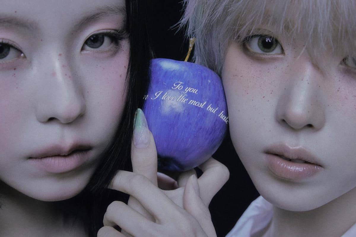 Kyujin dan Jiwoo dalam photoshoot album blue valentine