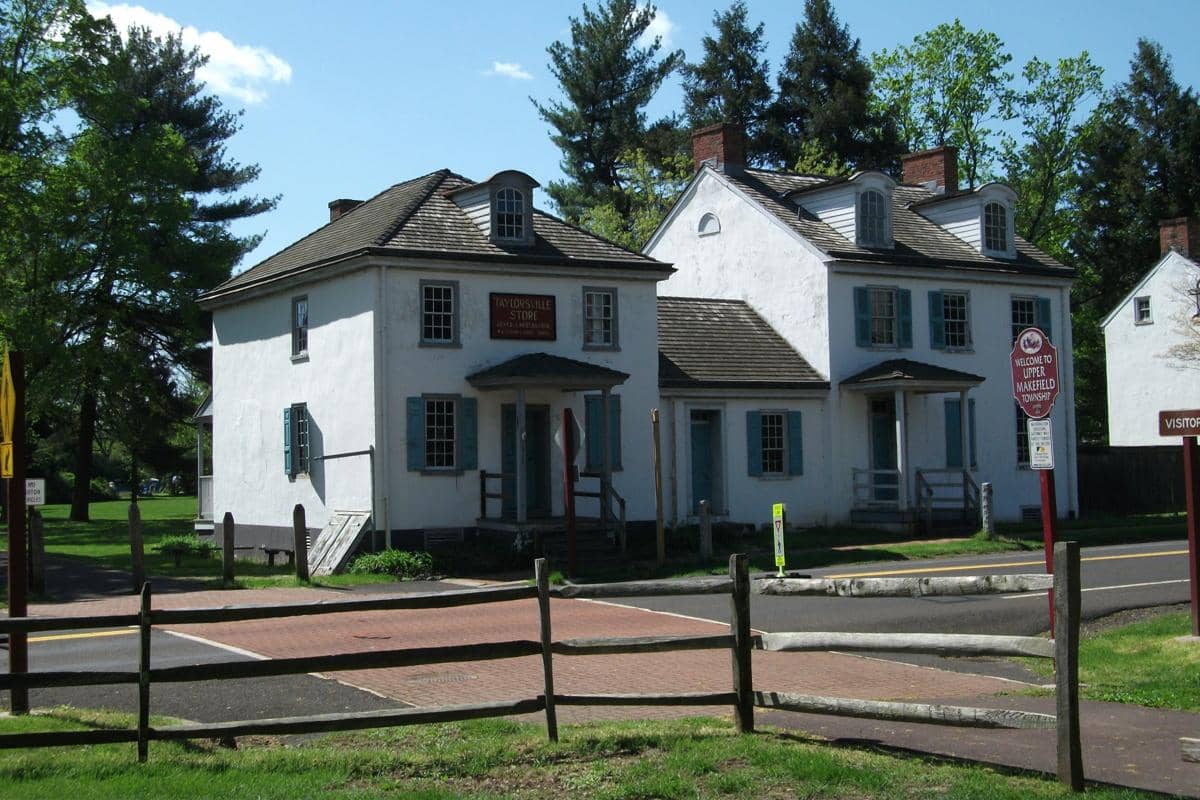 Ilustrasi rumah di pinggir jalan raya