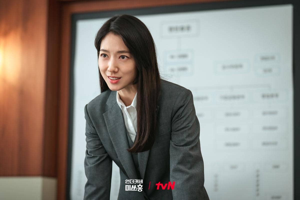 still cuts Undercover Miss Hong. 