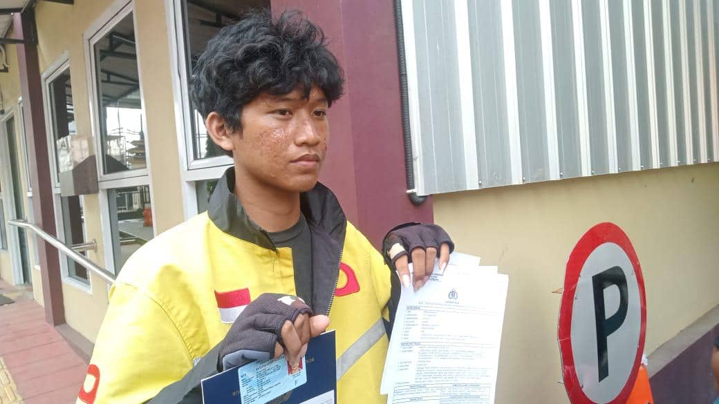 Korban Herdi saat melapor ke SPKT Polrestabes Palembang (Dok: Polrestabes Palembang)