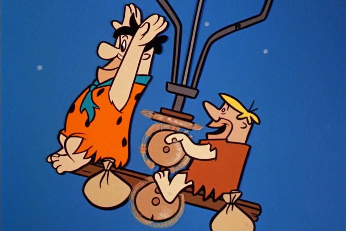 cuplikan adegan Fred dan Barney menaiki pesawat rakitan