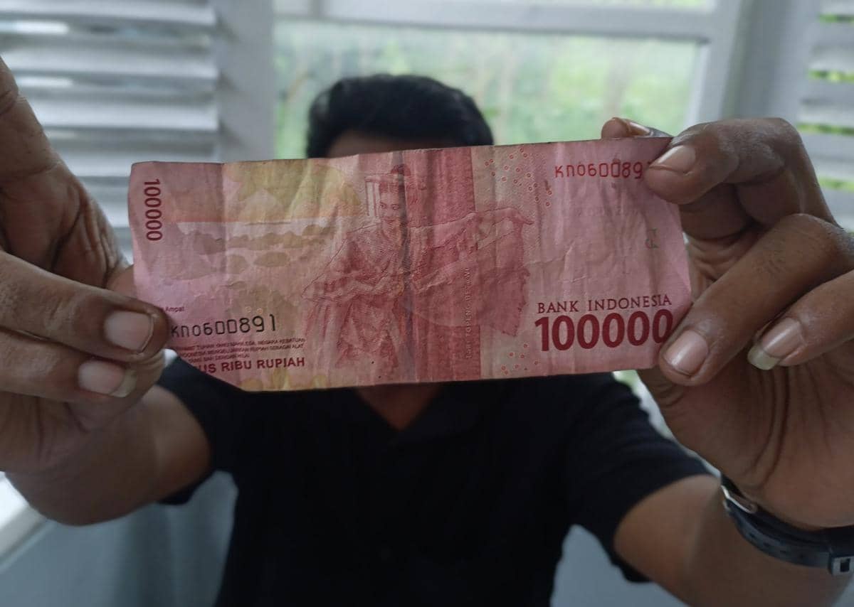 Ilustrasi uang rupiah dan dampak ekonomi. (IDN Times/Putra Bali Mula)