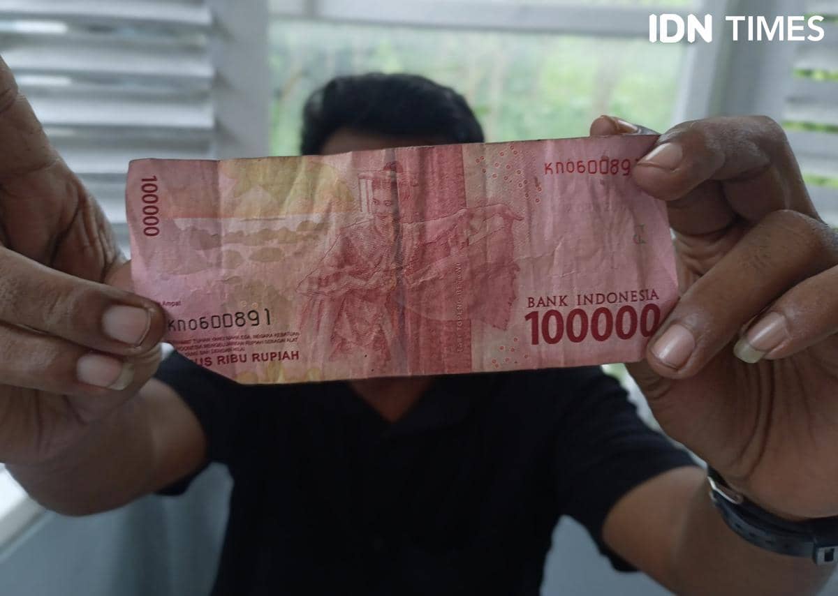 Ilustrasi uang rupiah dan dampak ekonomi. (IDN Times/Putra Bali Mula)
