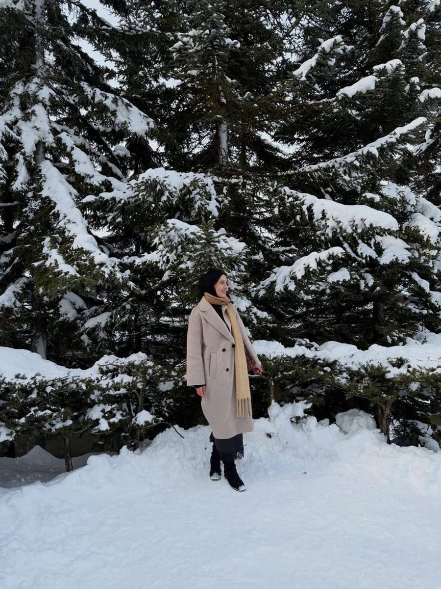 Dwi Handayani menikmati salju di Ningle Terrace.