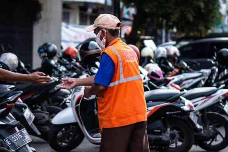 Ilustrasi tukang parkir 