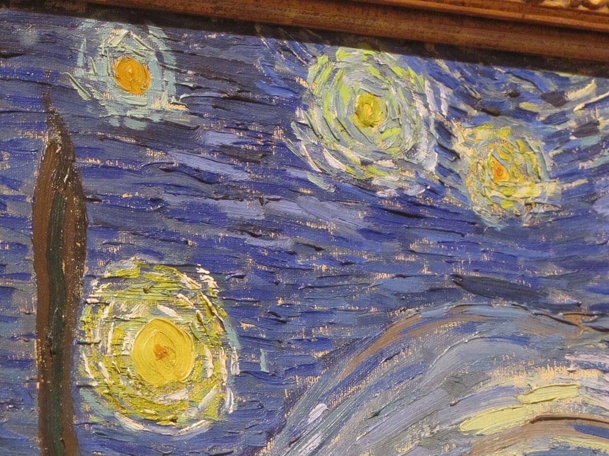 Detail dari lukisan minyak terkenal The Starry Night karya seniman pasca-impresionis Belanda, Vincent van Gogh. 