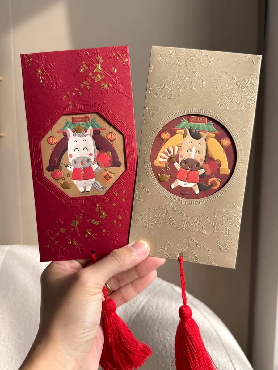 Ilustrasi angpao Imlek (Shopee/White Bridge)