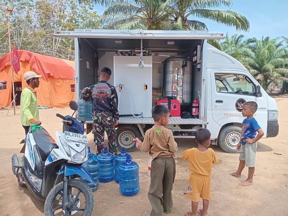 Kemenko Polkam terjunkan mobil Water Treatment untuk korban banjir Sumatera dan Aceh.