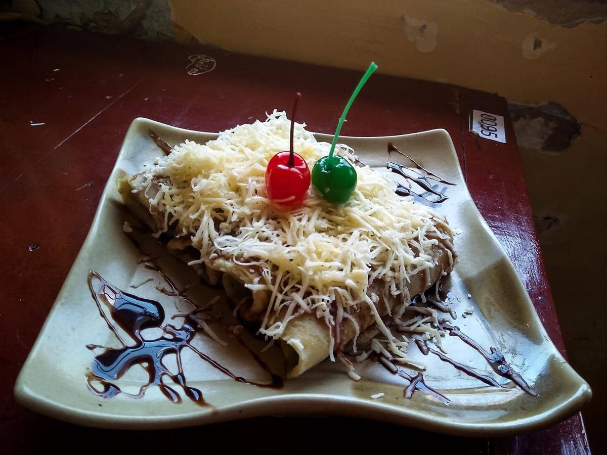 ilustrasi dadar gulung tape pisang