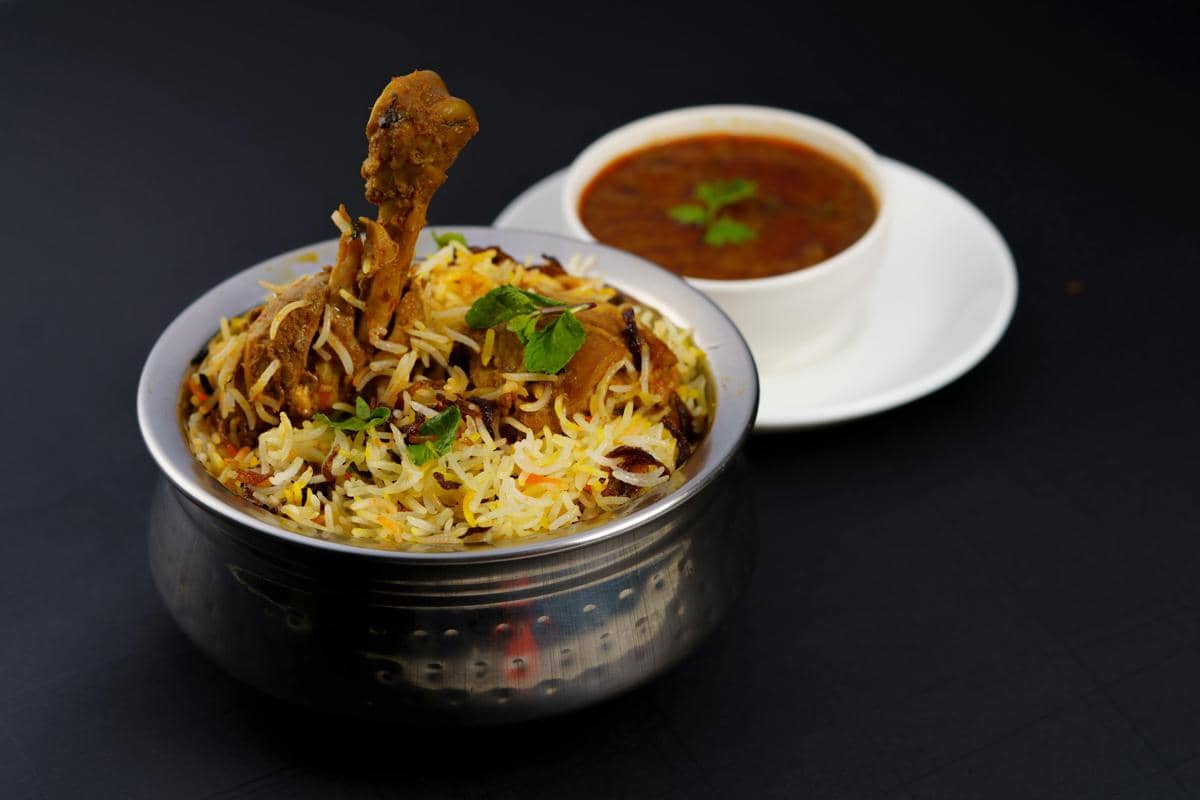 Delicious Indian Chicken Biryani with Spicy Curry