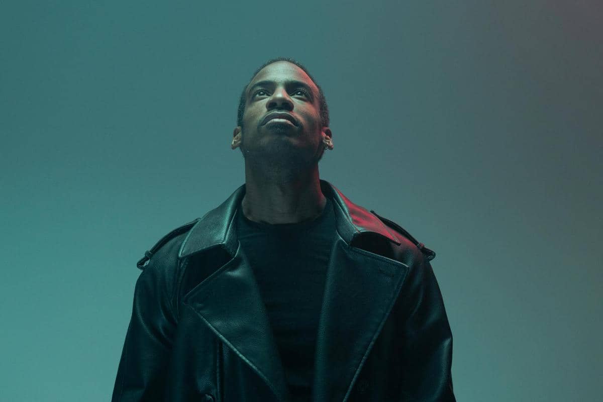 ilustrasi pria memakai setelan hitam