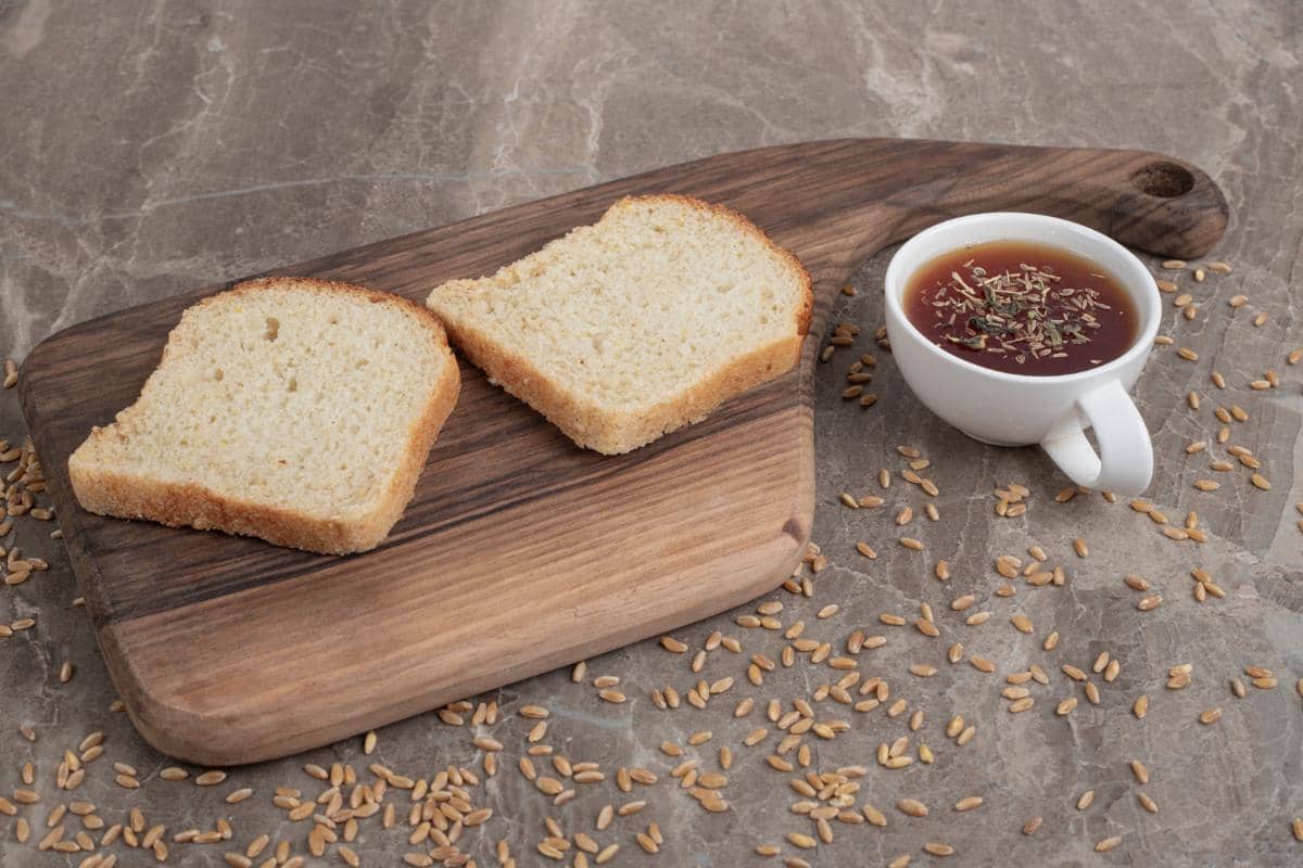 ilustrasi roti gandum yang disajikan dengan teh 