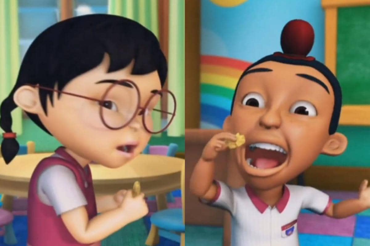 Jarjit dan Mei Mei mencicipi kue kering di kelas ketika teman-temannya berpuasa.