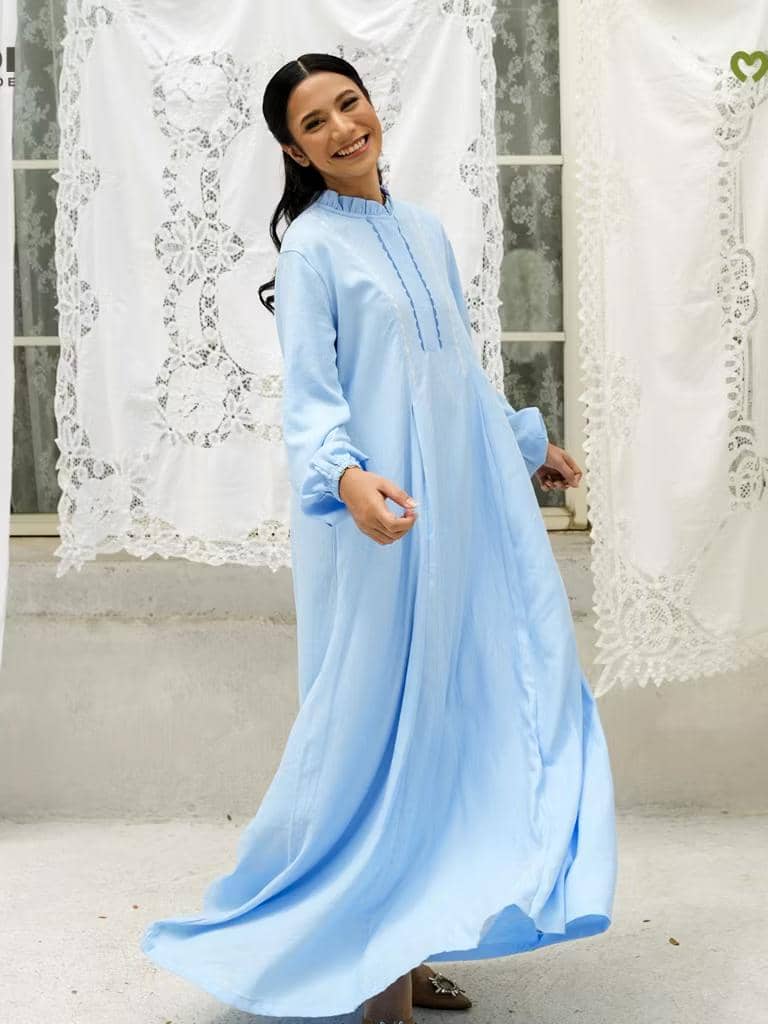 ilustrasi gamis Lebaran 2026