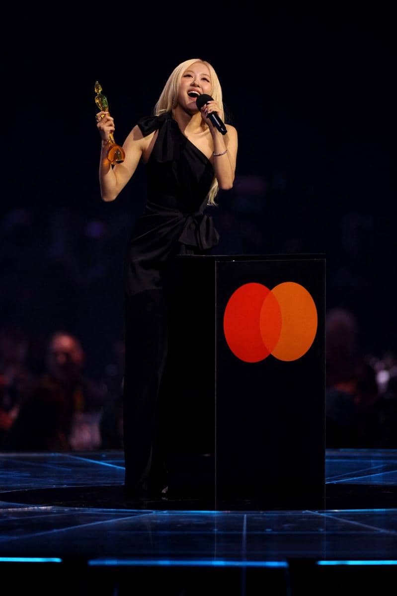 South Korean singer ROSÉ speaks on stage after receiving the award for International song of the year during the BRIT Awards 2026 at the Co-op Live arena, in Manchester on February 28, 2026