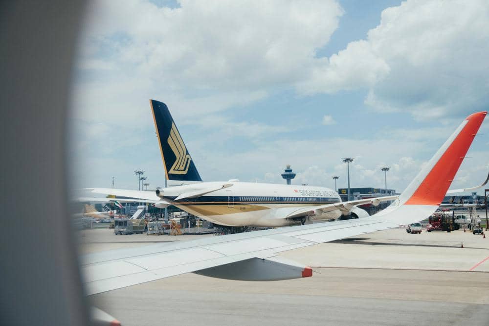 ilustrasi pesawat Singapore Airlines di bandara