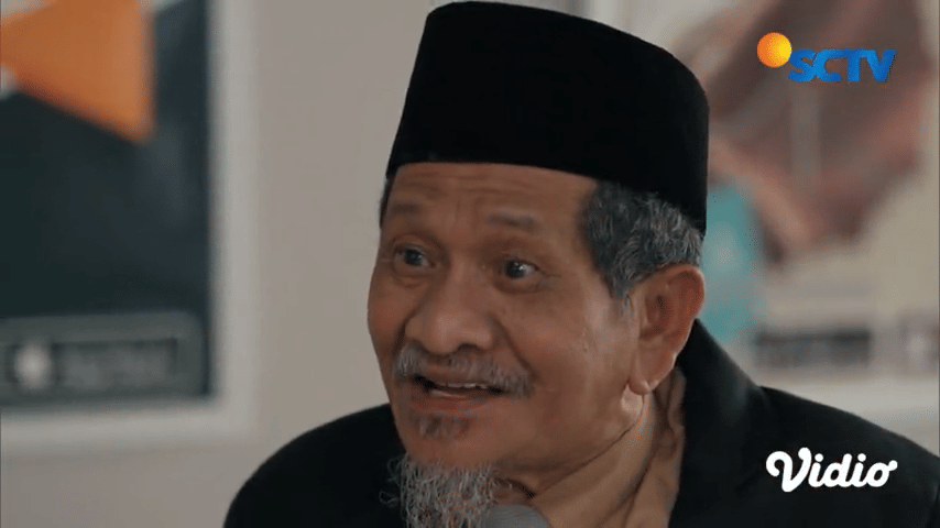 Idrus Madani muncul sebagai anggota dewan di Para Pencari Tuhan Jilid 18: Dunia Sementara, Coy!