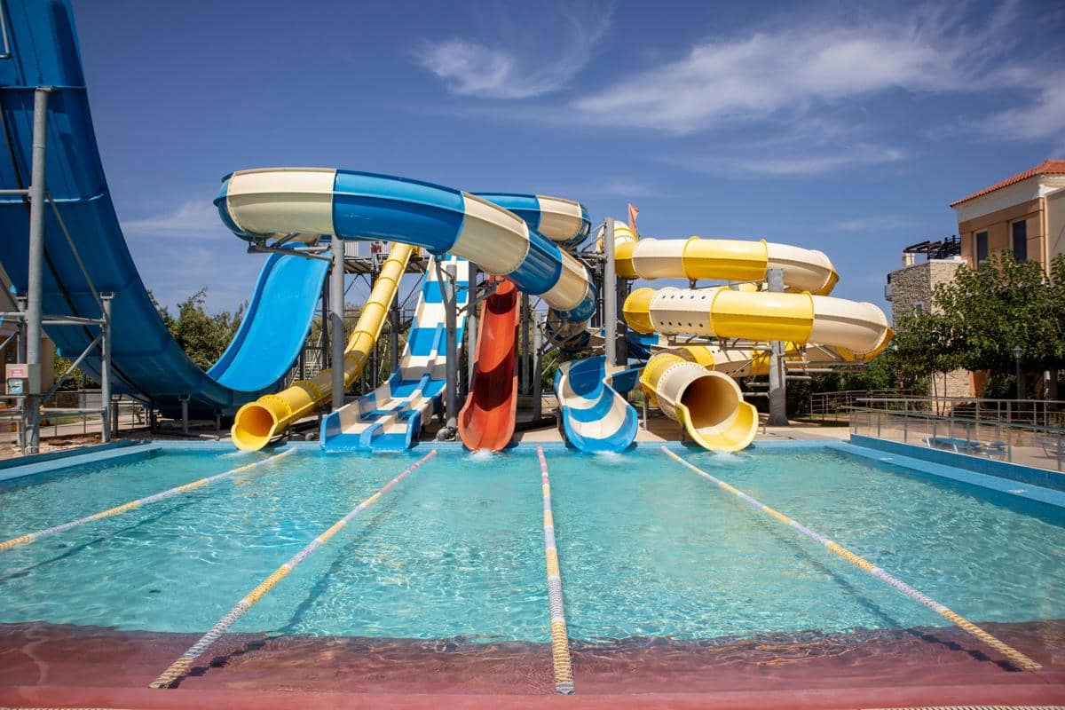 a water park with a water slide and slides