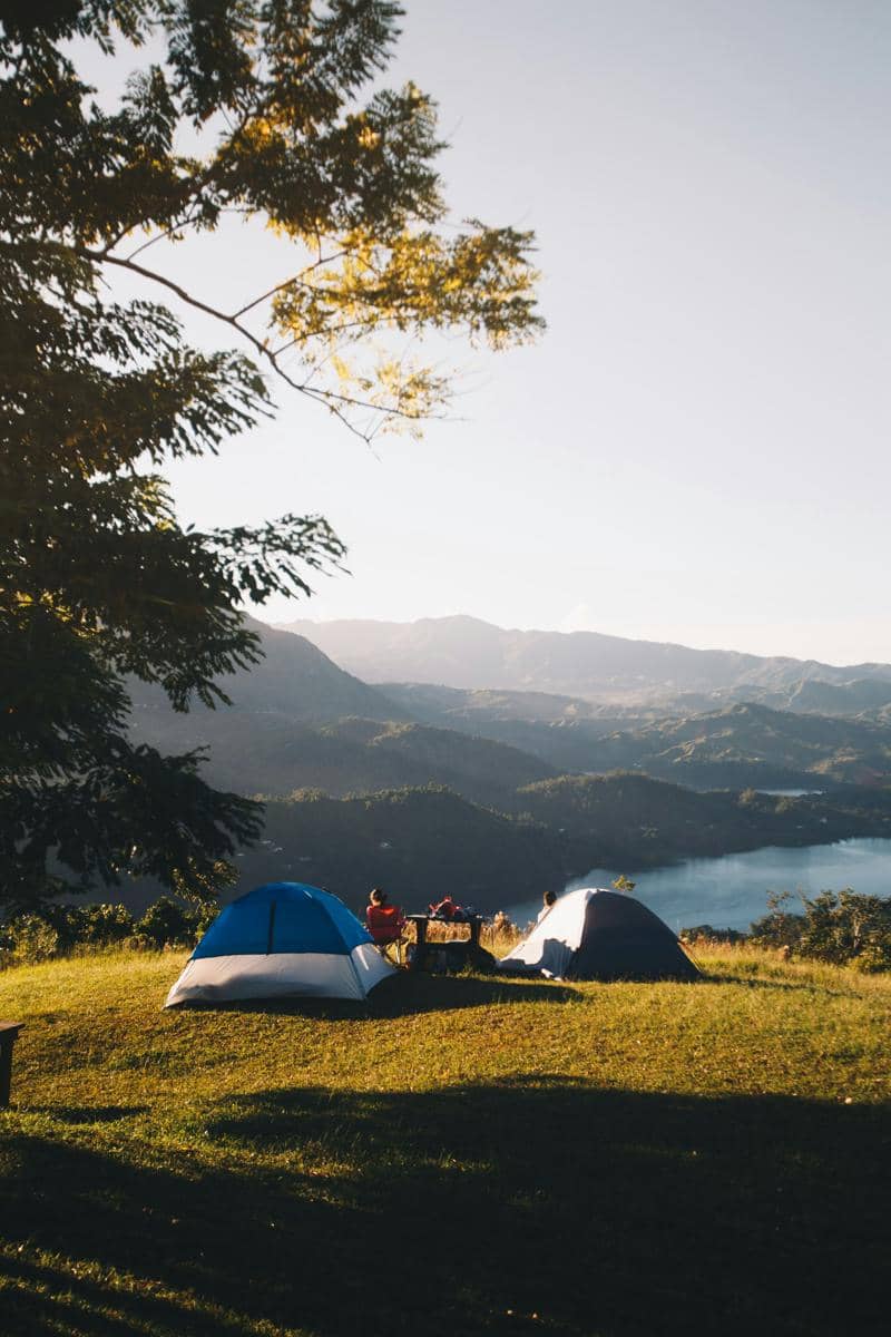 set-up tents near body of water