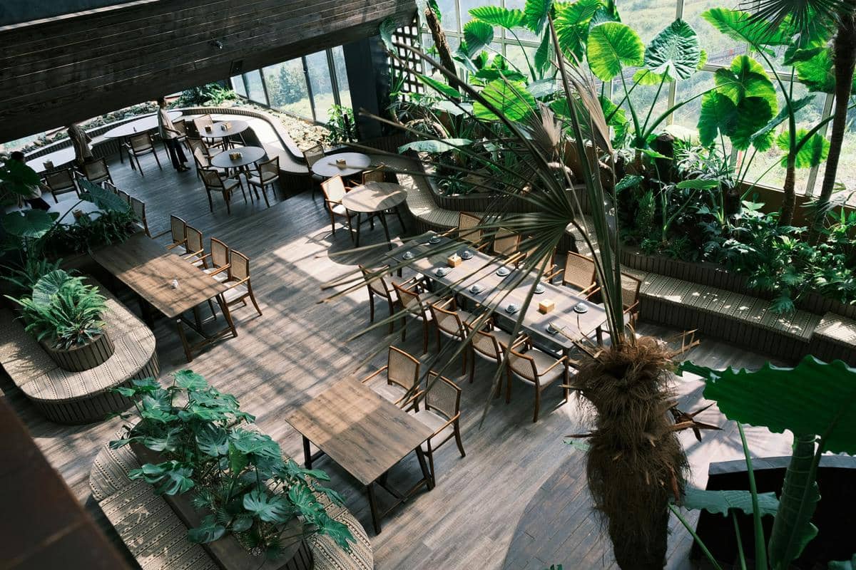 a restaurant with a lot of tables and chairs