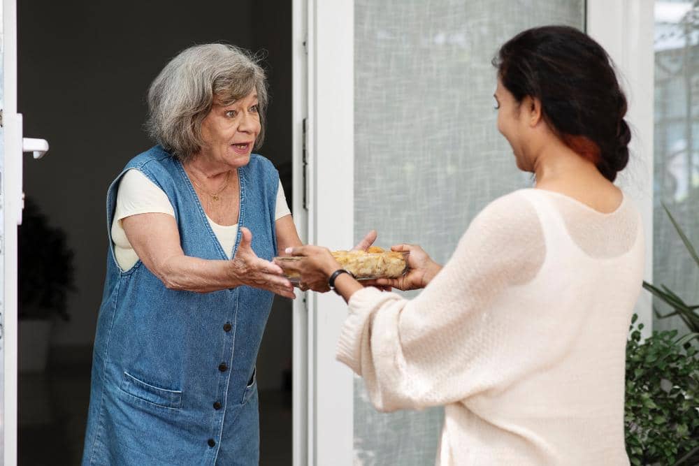 ilustrasi berbagi makanan dengan tetangga