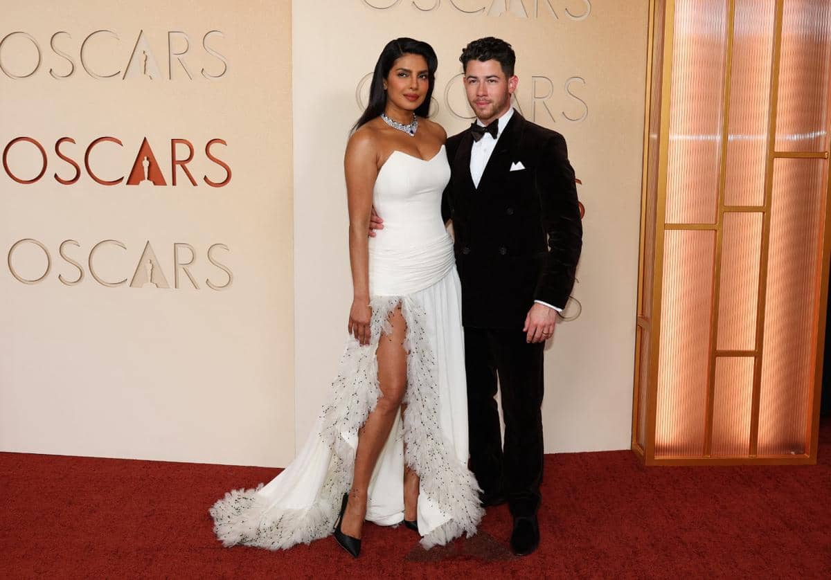 Indian actress, model Priyanka Chopra and US singer Nick Jonas attends the 98th Annual Academy Awards at the Dolby Theatre in Hollywood, California on March 15, 2026. (Photo by ANGELA WEISS / AFP)