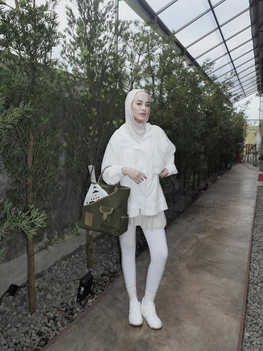 Gaya olahraga Emy Aghnia